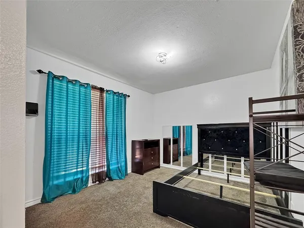 view of living room with furniture and large window