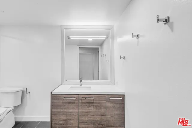 a bathroom with a sink and a toilet