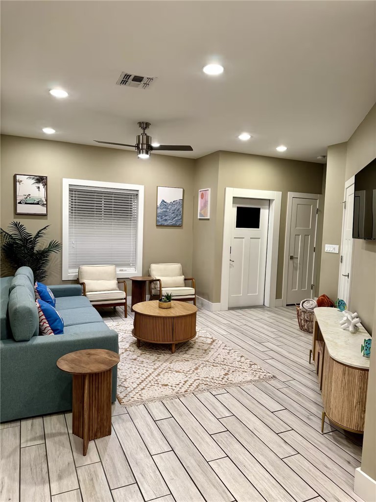 14310 Ridley Way Corpus Christi, TX 78418 - Photo 5 of 19 a living room with furniture and a wooden floor
