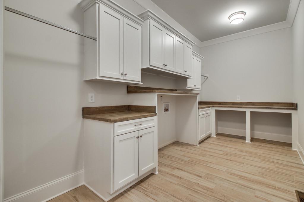 112 Alton Road Nashville, TN 37205 - Photo 17 of 30 a kitchen with white cabinets and a sink