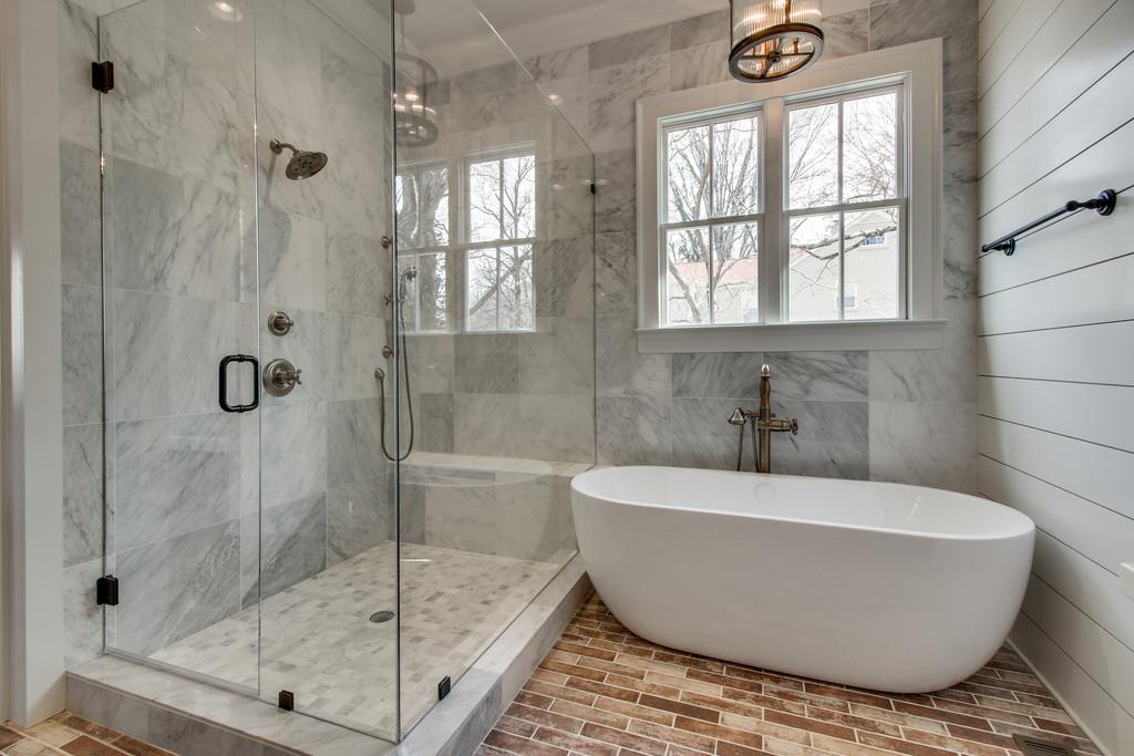 112 Alton Road Nashville, TN 37205 - Photo 20 of 30 a white bath tub sitting next to a shower