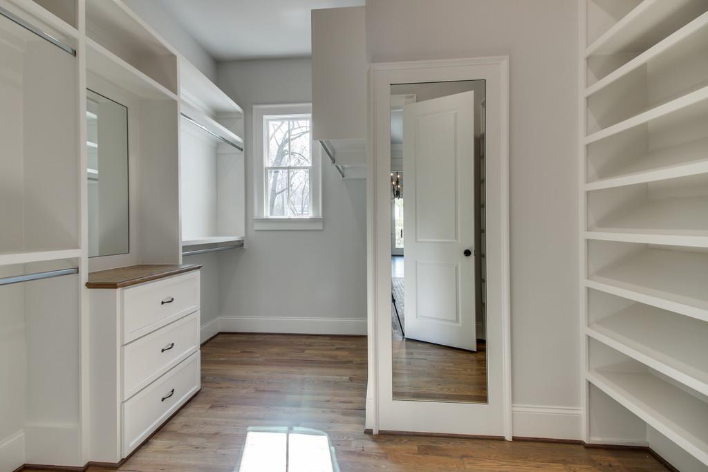 112 Alton Road Nashville, TN 37205 - Photo 21 of 30 a bathroom with a double vanity sink and a mirror