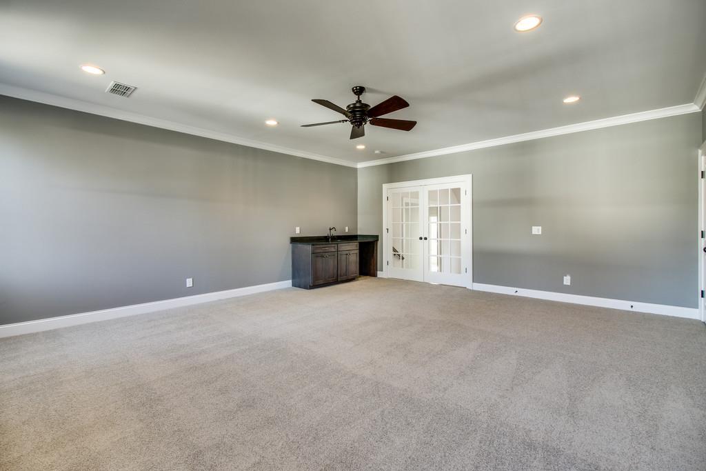 112 Alton Road Nashville, TN 37205 - Photo 27 of 30 an empty room with chandelier fan and windows
