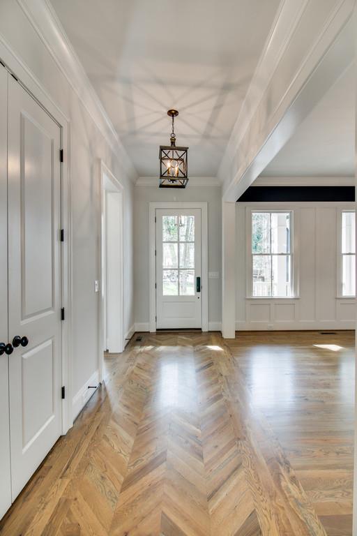 112 Alton Road Nashville, TN 37205 - Photo 4 of 30 a view of empty room with wooden floor and fan