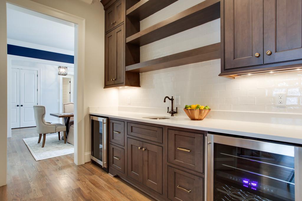 112 Alton Road Nashville, TN 37205 - Photo 10 of 30 a kitchen with stainless steel appliances granite countertop a sink and wooden cabinets