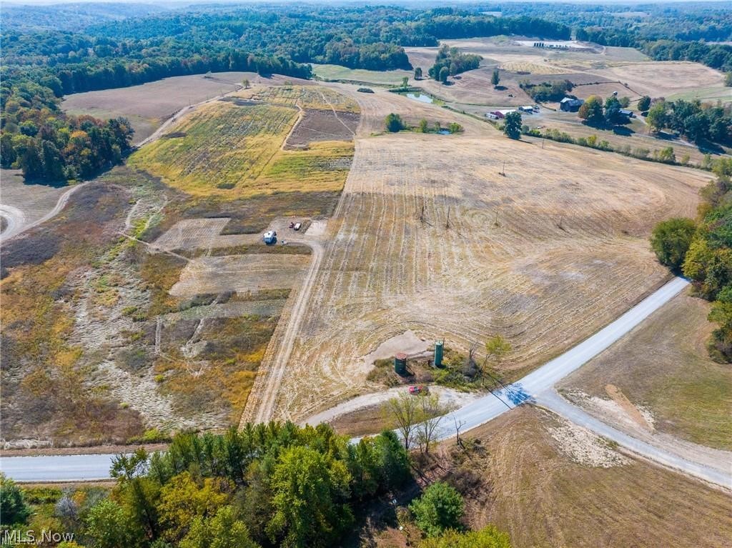 7100 Halo Road Northwest Dellroy, OH 44620 - Photo 10 of 10 Aerial view of sparsely populated area featuring rows of crops