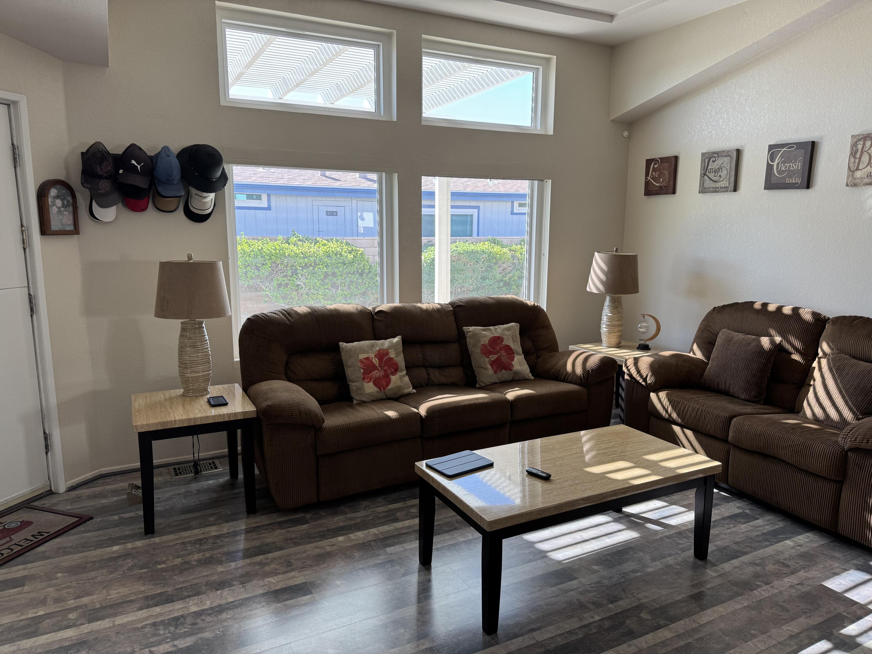 35280 South Border Thousand Palms, CA 92276 - Photo 14 of 50 a living room with furniture and a window