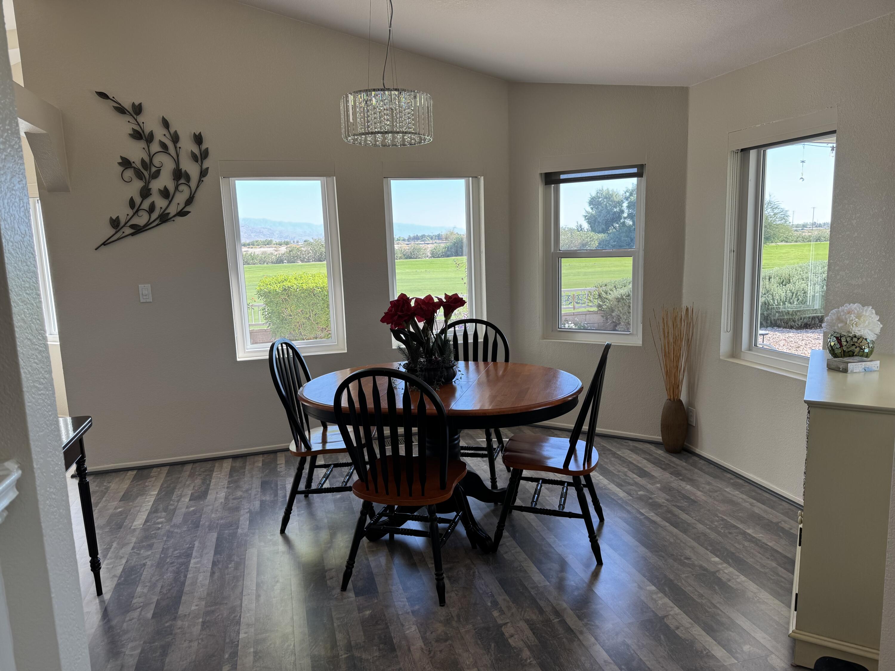 35280 South Border Thousand Palms, CA 92276 - Photo 20 of 50 a view of a dining room with furniture and window