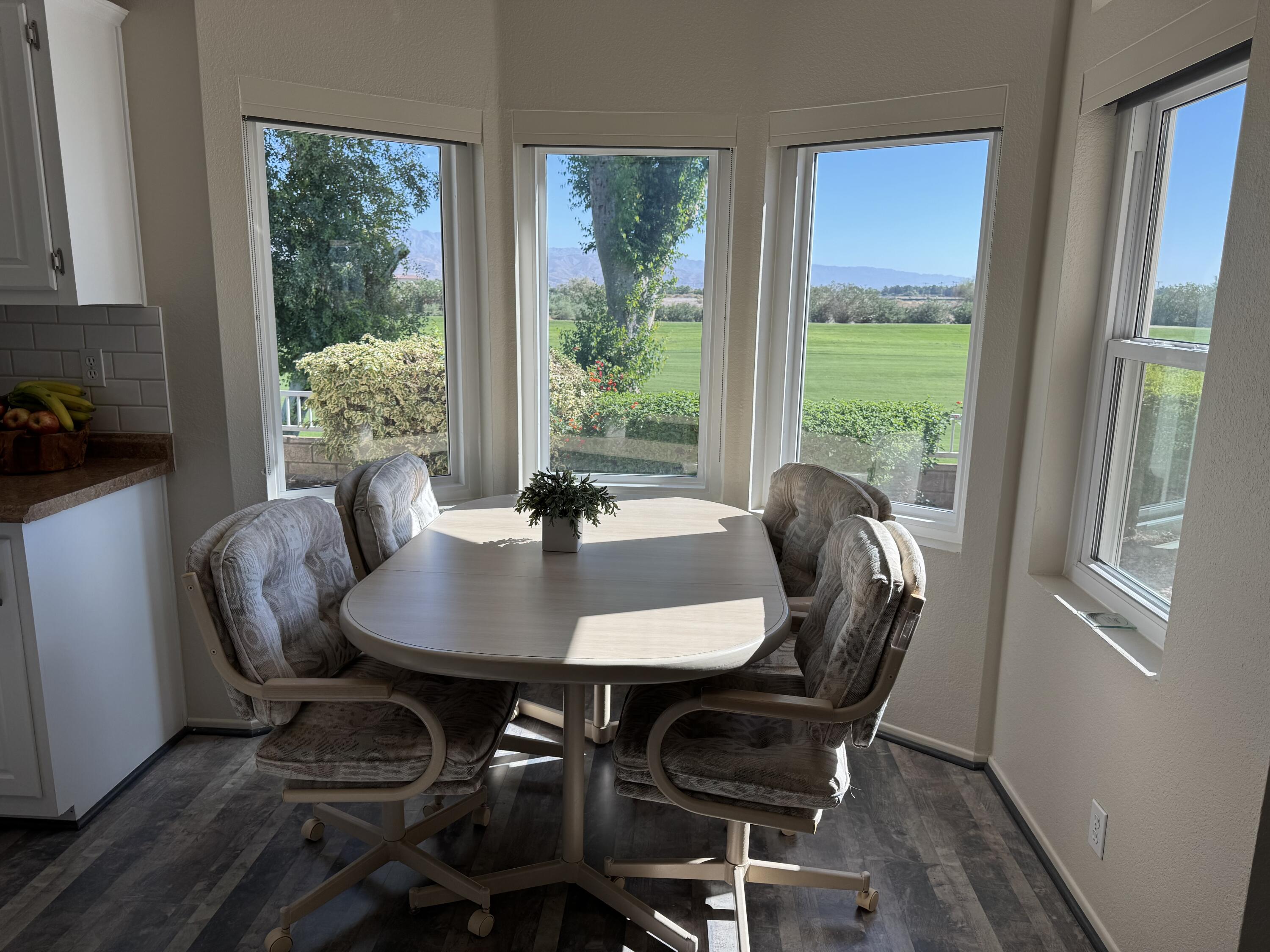 35280 South Border Thousand Palms, CA 92276 - Photo 24 of 50 a view of a dining room with furniture window and outside view