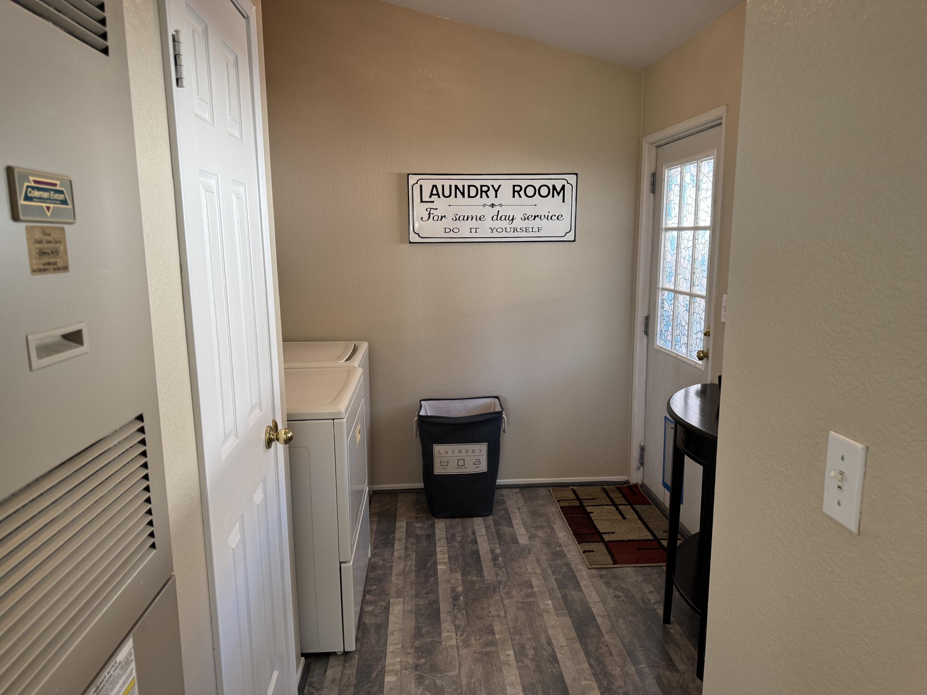 35280 South Border Thousand Palms, CA 92276 - Photo 27 of 50 a view of a hallway with wooden floor and a bathroom