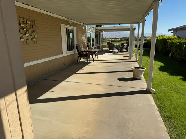 a view of living room with furniture and garden