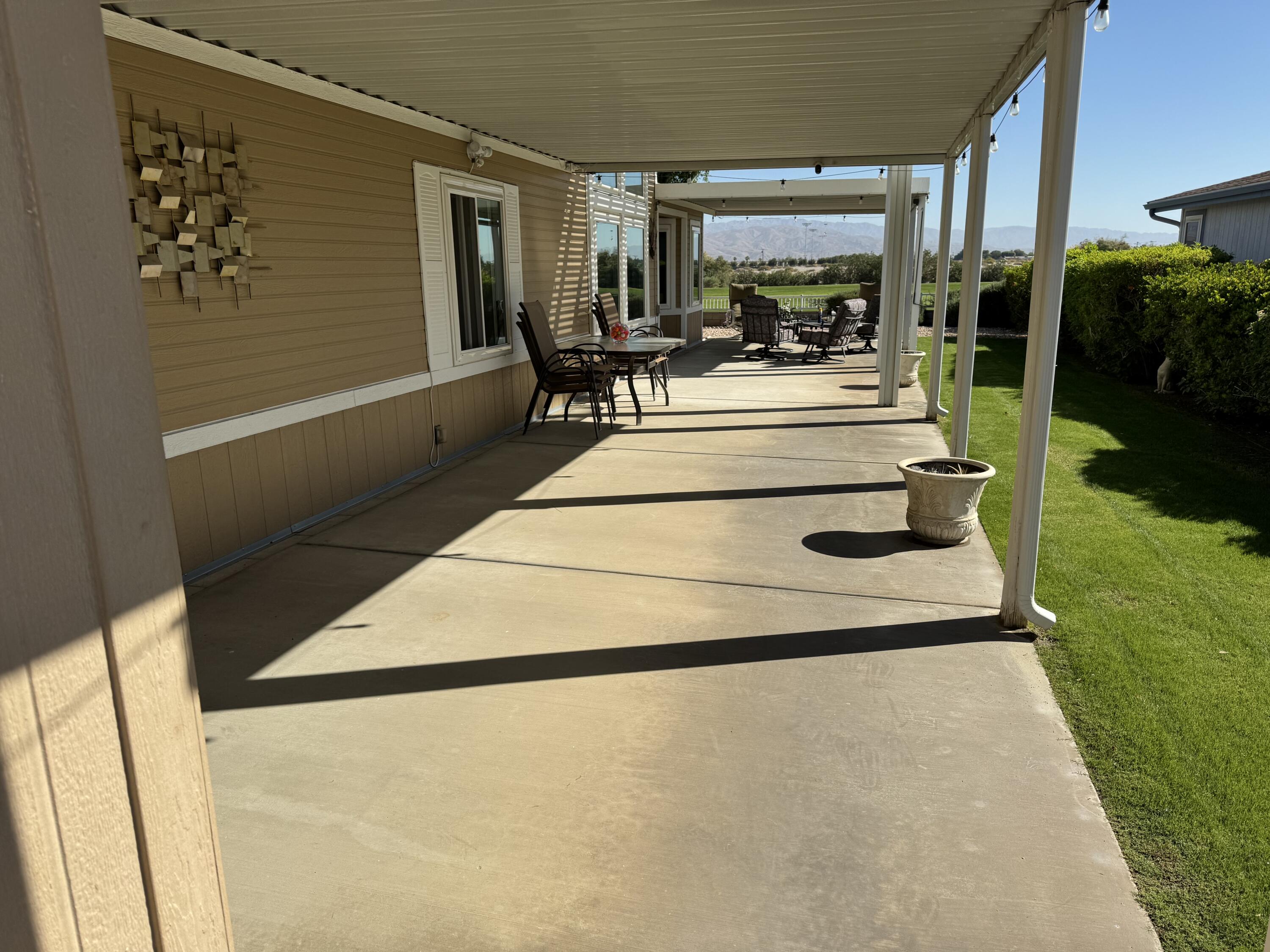 35280 South Border Thousand Palms, CA 92276 - Photo 3 of 50 a view of living room with furniture and garden