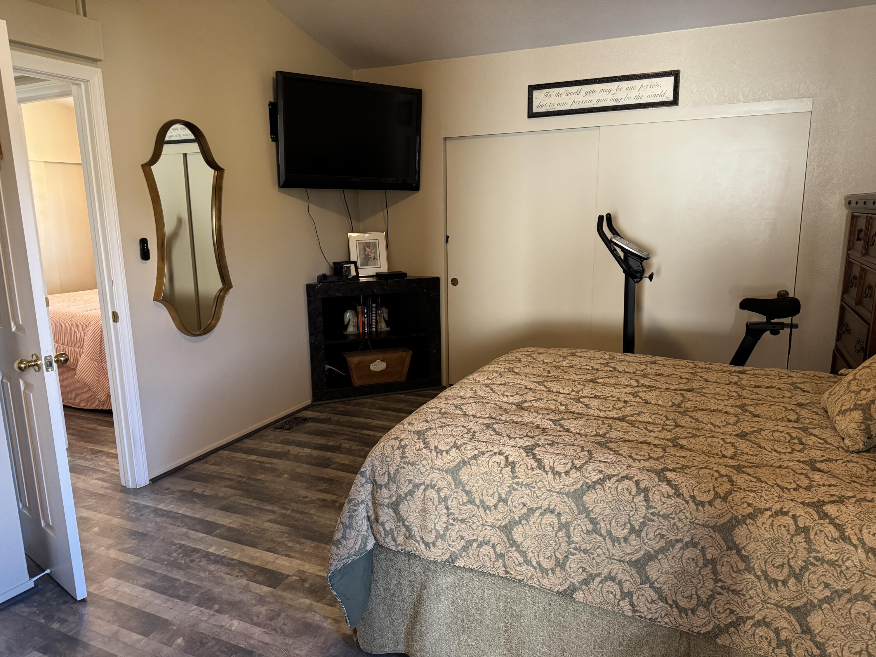 35280 South Border Thousand Palms, CA 92276 - Photo 31 of 50 a bedroom with a bed and a flat screen tv