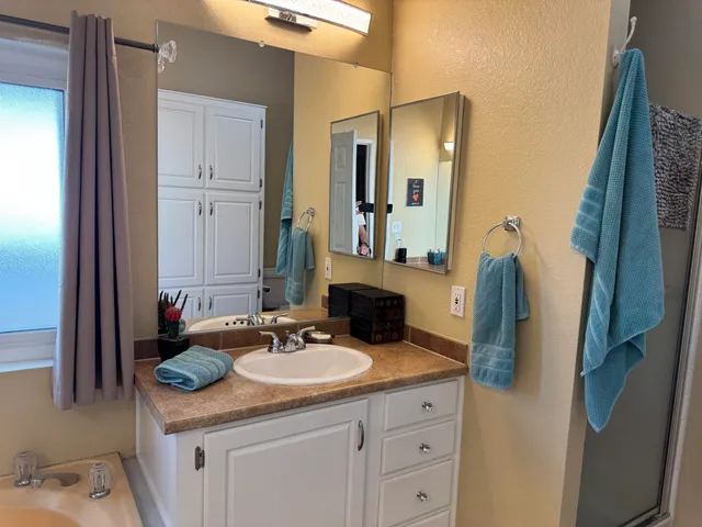 a bathroom with a toilet and a sink