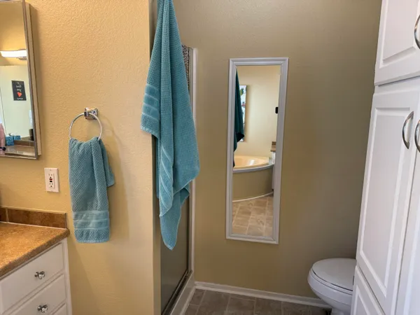a bathroom with a tub and sink