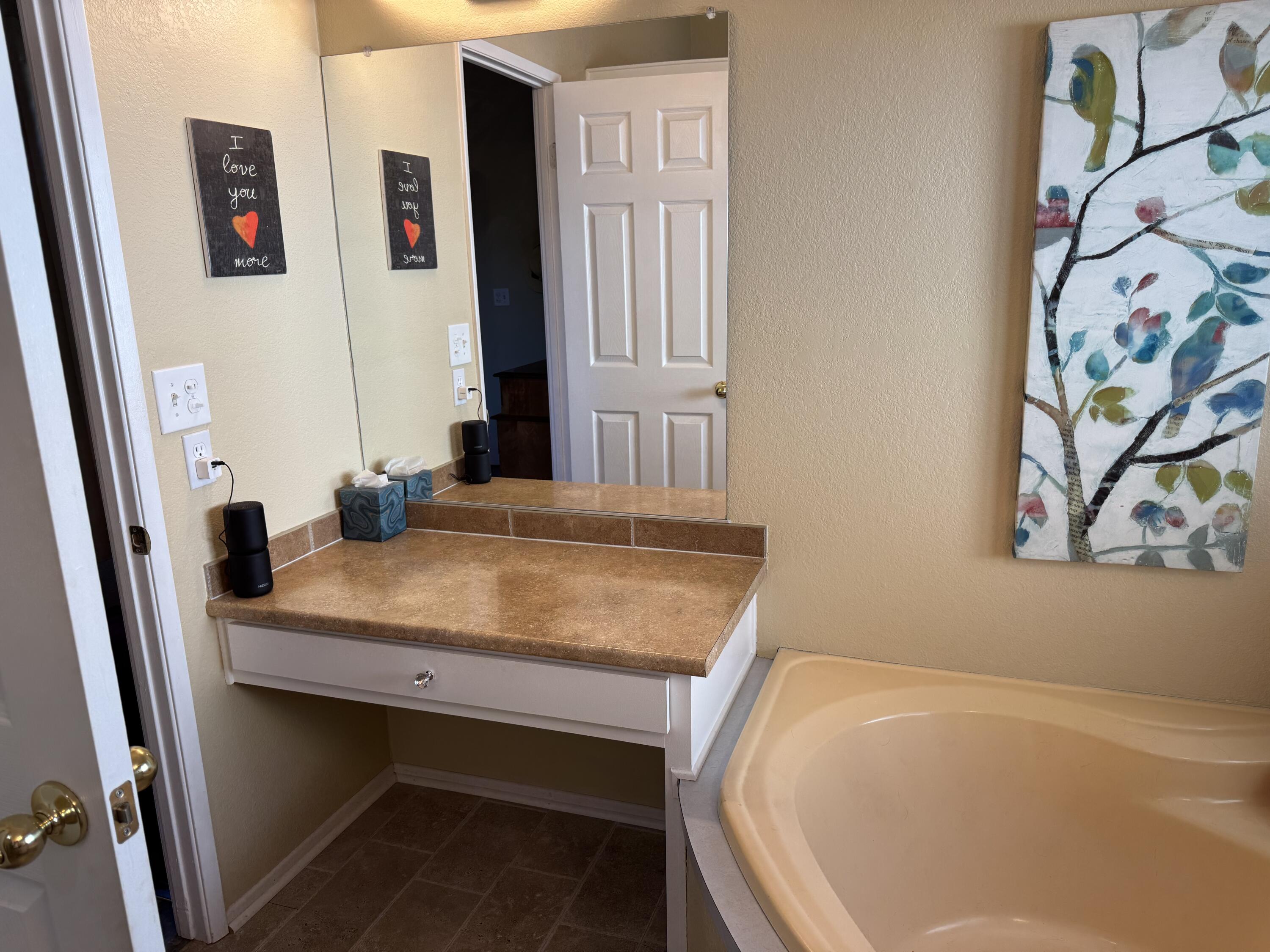 35280 South Border Thousand Palms, CA 92276 - Photo 36 of 50 a bathroom with a sink and a mirror