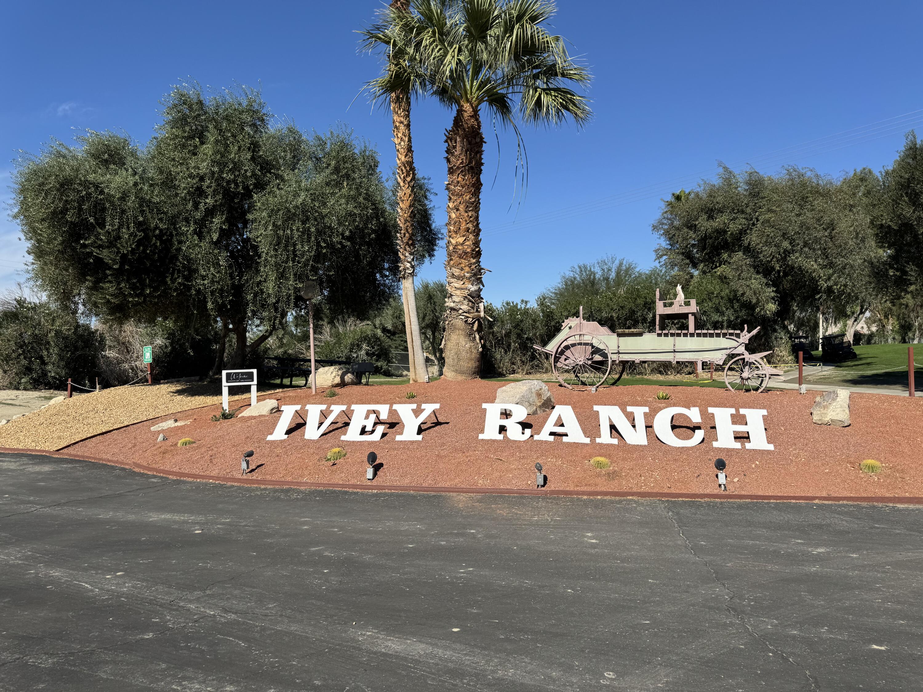 35280 South Border Thousand Palms, CA 92276 - Photo 39 of 50 a sign board with street and trees