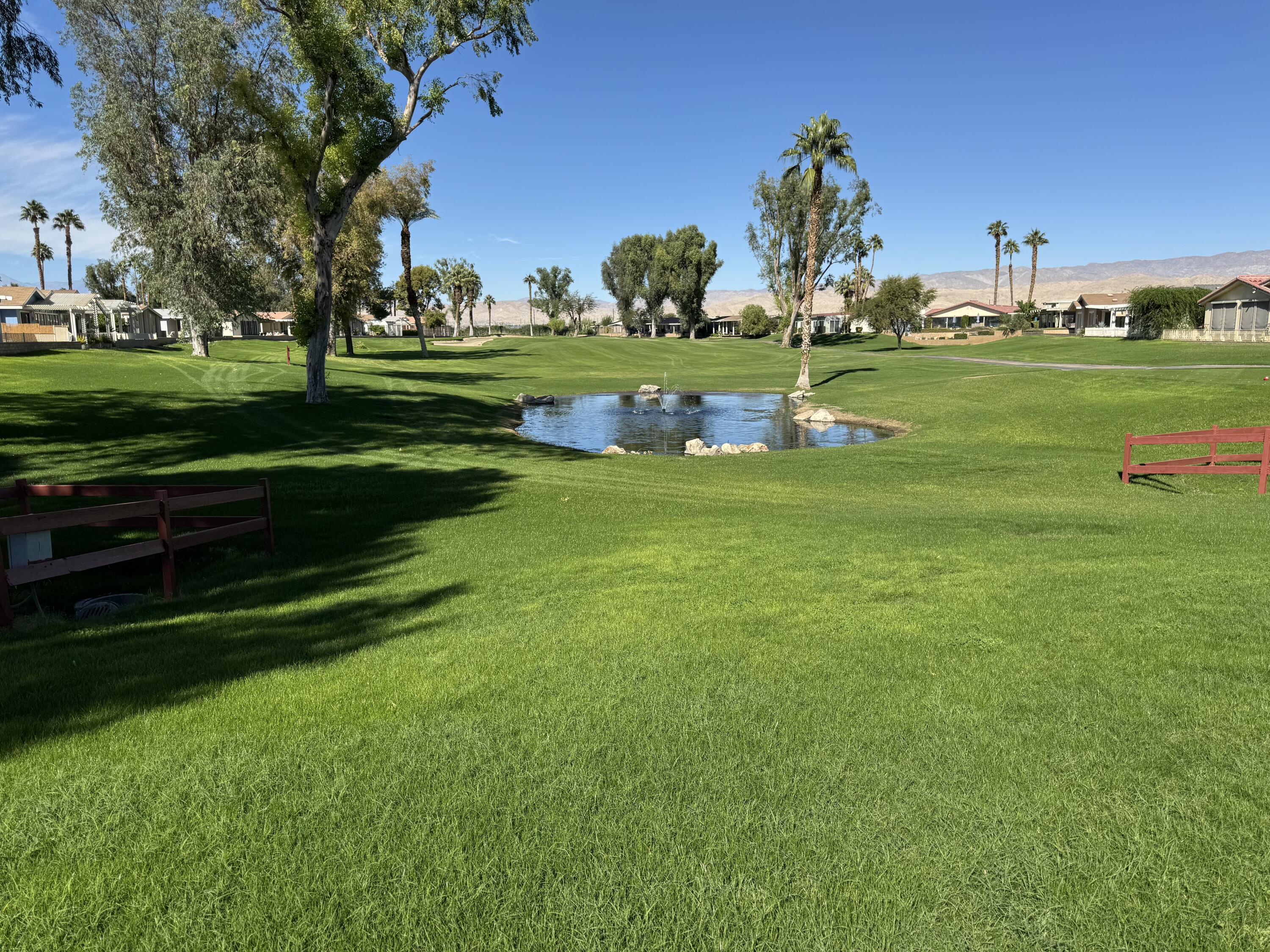 35280 South Border Thousand Palms, CA 92276 - Photo 43 of 50 a view of a park with houses in the background