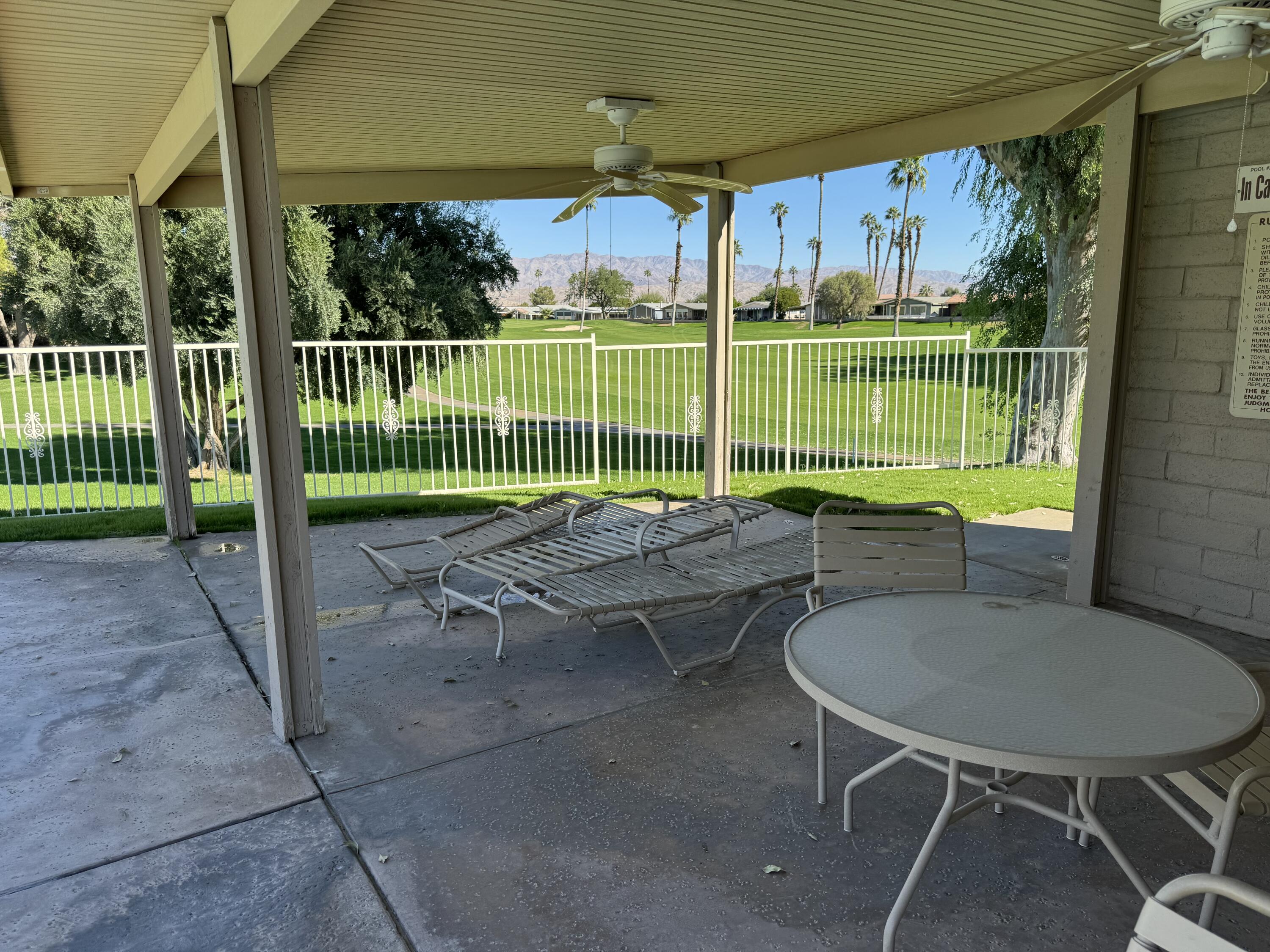 35280 South Border Thousand Palms, CA 92276 - Photo 47 of 50 a view of a chair and table in the backyard