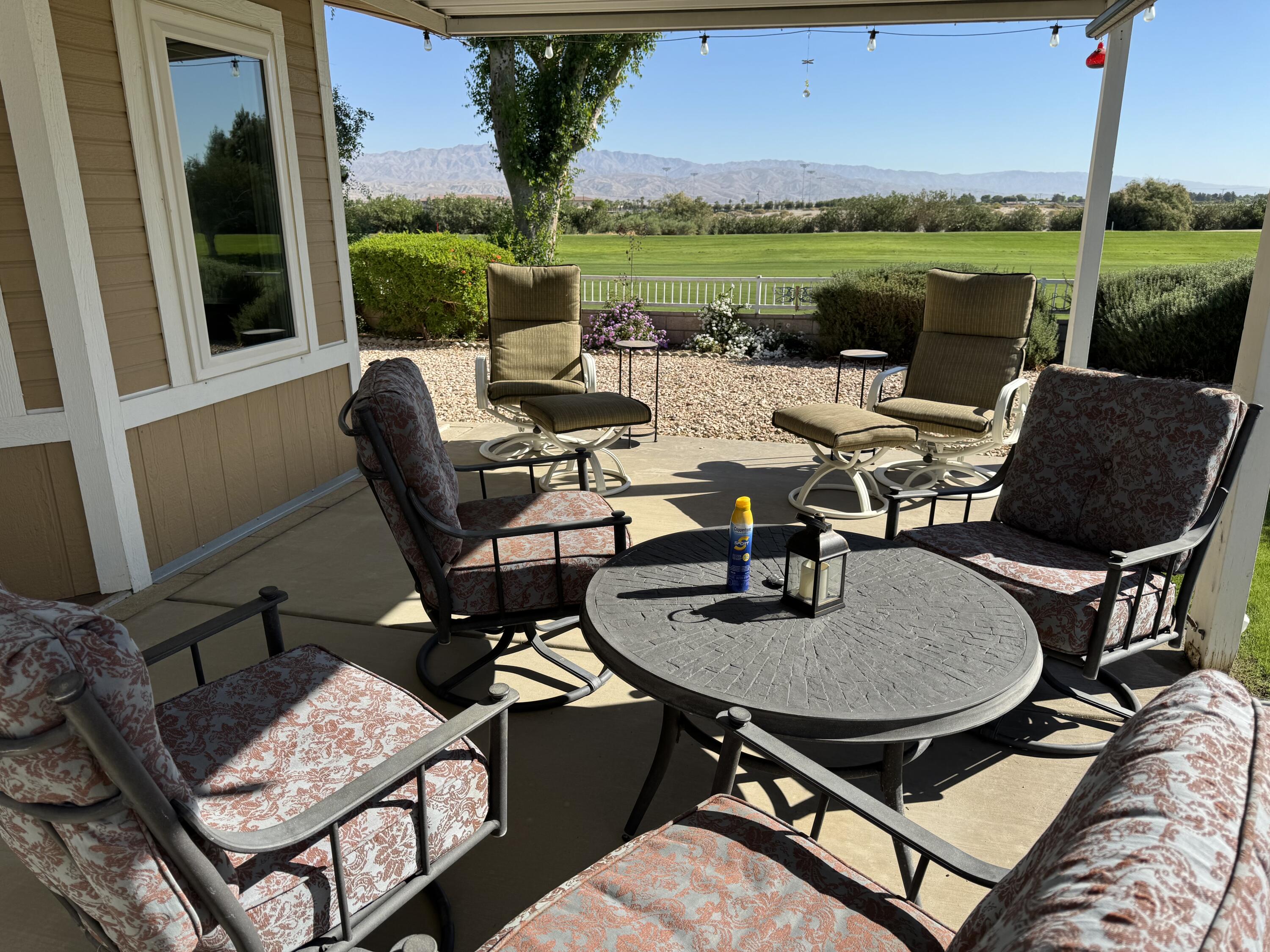 35280 South Border Thousand Palms, CA 92276 - Photo 5 of 50 a view of a patio with lawn chairs
