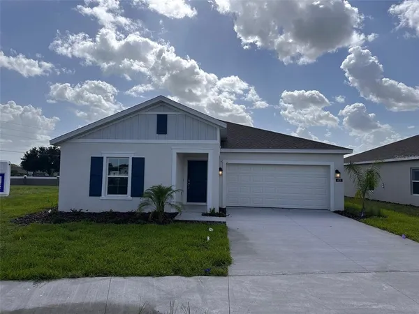 a front view of house with yard