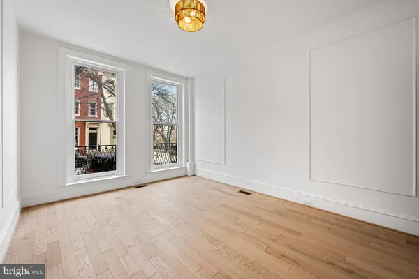 an empty room with windows