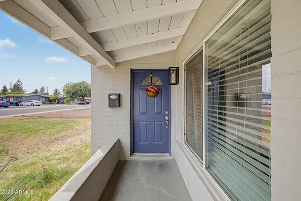 a view of balcony with furniture