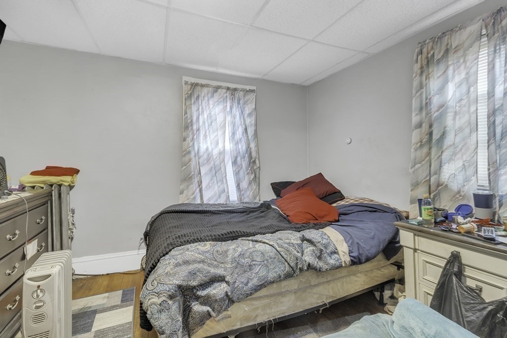18 Fairmount Street Springfield, MA 01108 - Photo 41 of 42 a bedroom with a bed and window