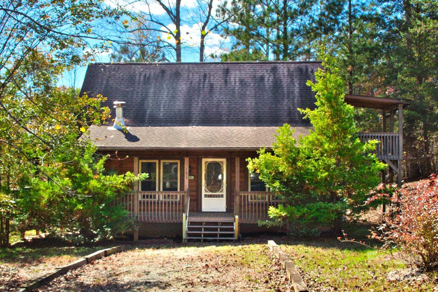 155 Northridge Drive, Unit 79 Rutherfordton, NC 28139 - Photo 2 of 31 a front view of a house with garden