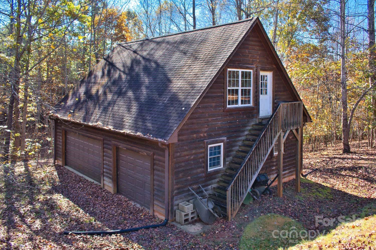 155 Northridge Drive, Unit 79 Rutherfordton, NC 28139 - Photo 22 of 31 a view of a house with a yard