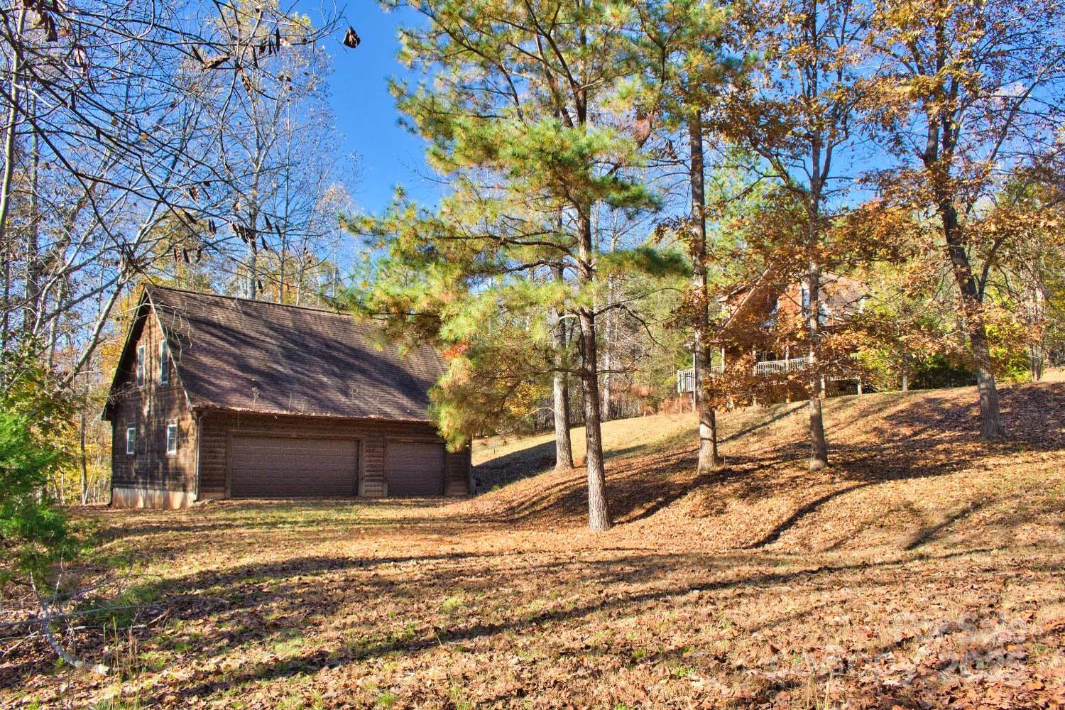 155 Northridge Drive, Unit 79 Rutherfordton, NC 28139 - Photo 31 of 31 a view of a house with a yard