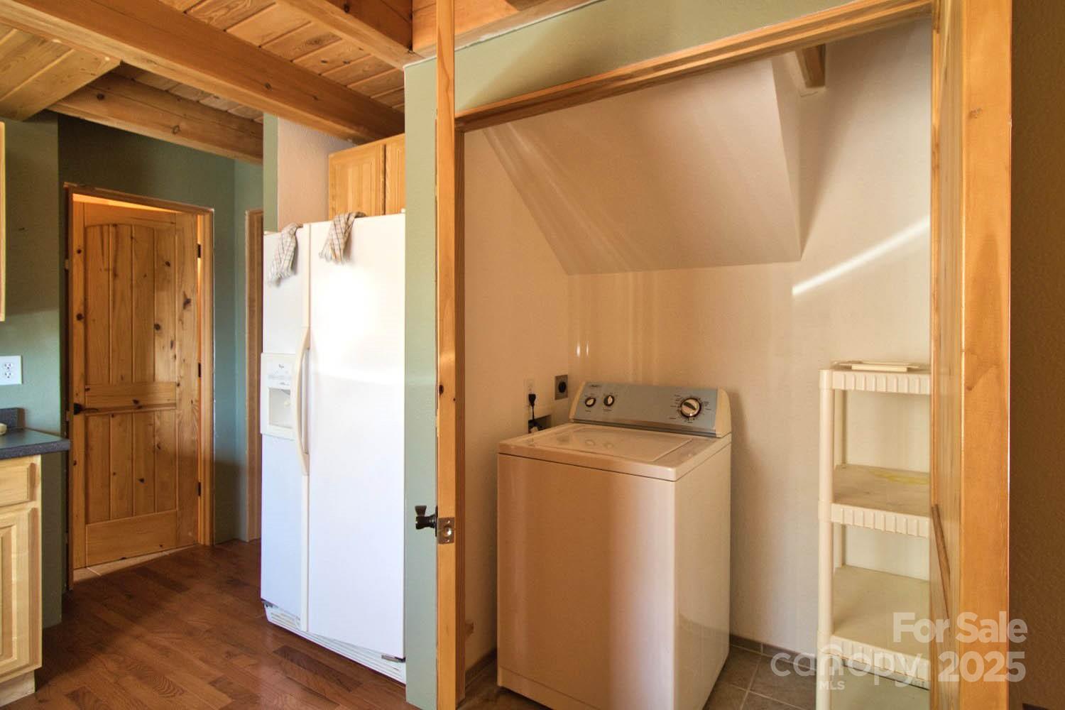 155 Northridge Drive, Unit 79 Rutherfordton, NC 28139 - Photo 10 of 31 a utility room with dryer and washer