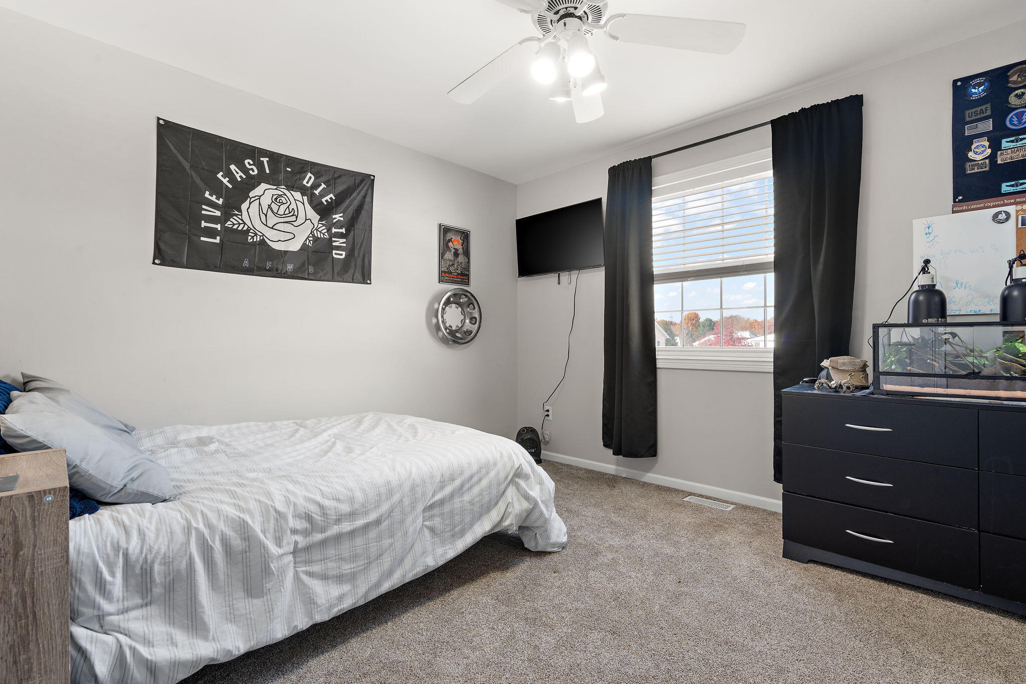 696 Admiral Drive Porter, IN 46304 - Photo 16 of 27 a bedroom with a bed and a window