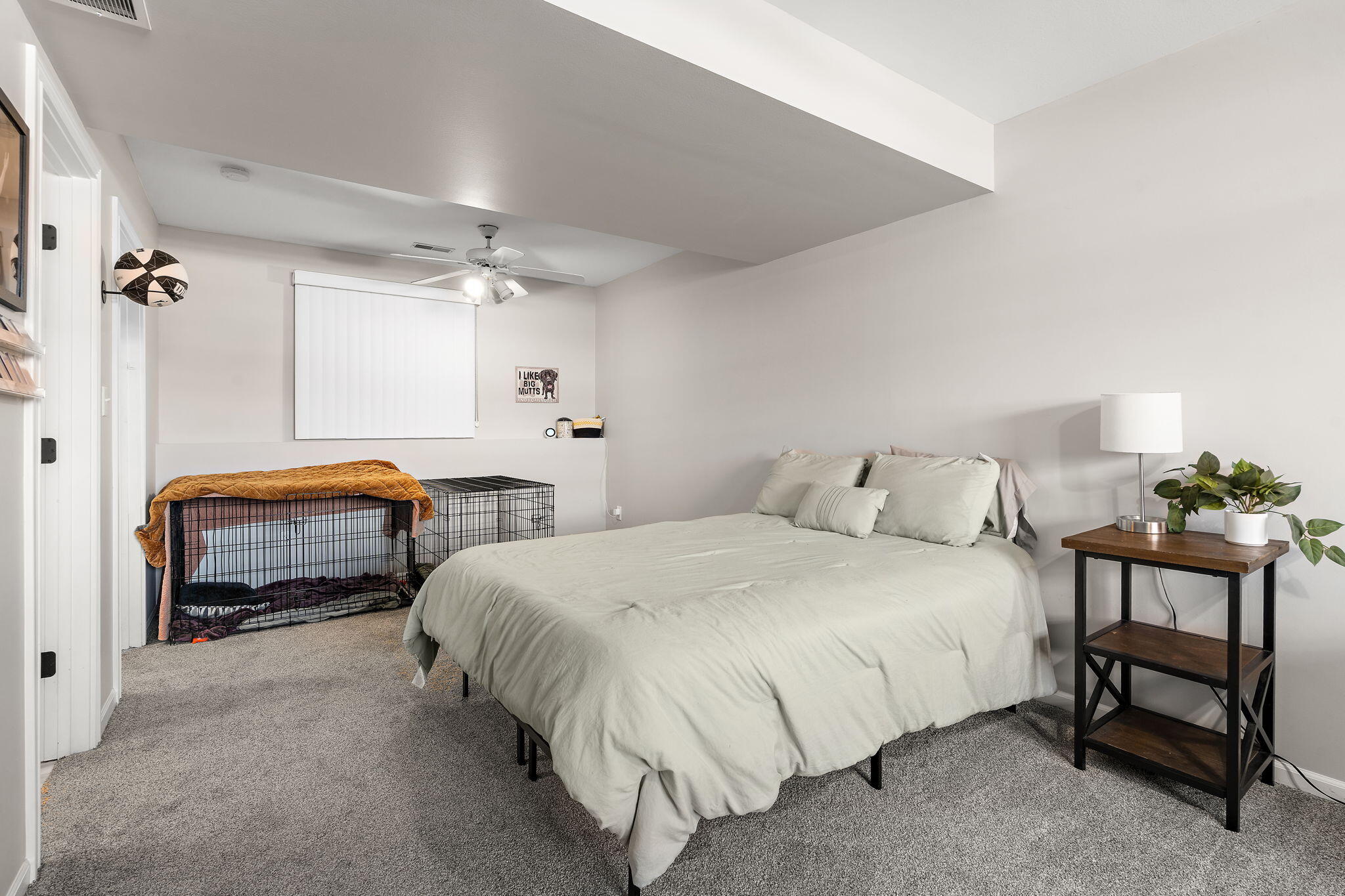 696 Admiral Drive Porter, IN 46304 - Photo 20 of 27 a bedroom with a bed and a chandelier