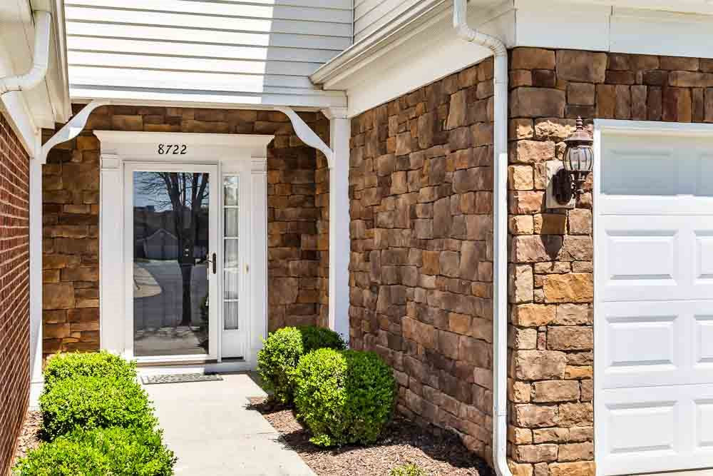 8722 Owl Roost Place Raleigh, NC 27617 - Photo 2 of 26 Beautiful stone and brick accents and a covered porch! Welcome Home!