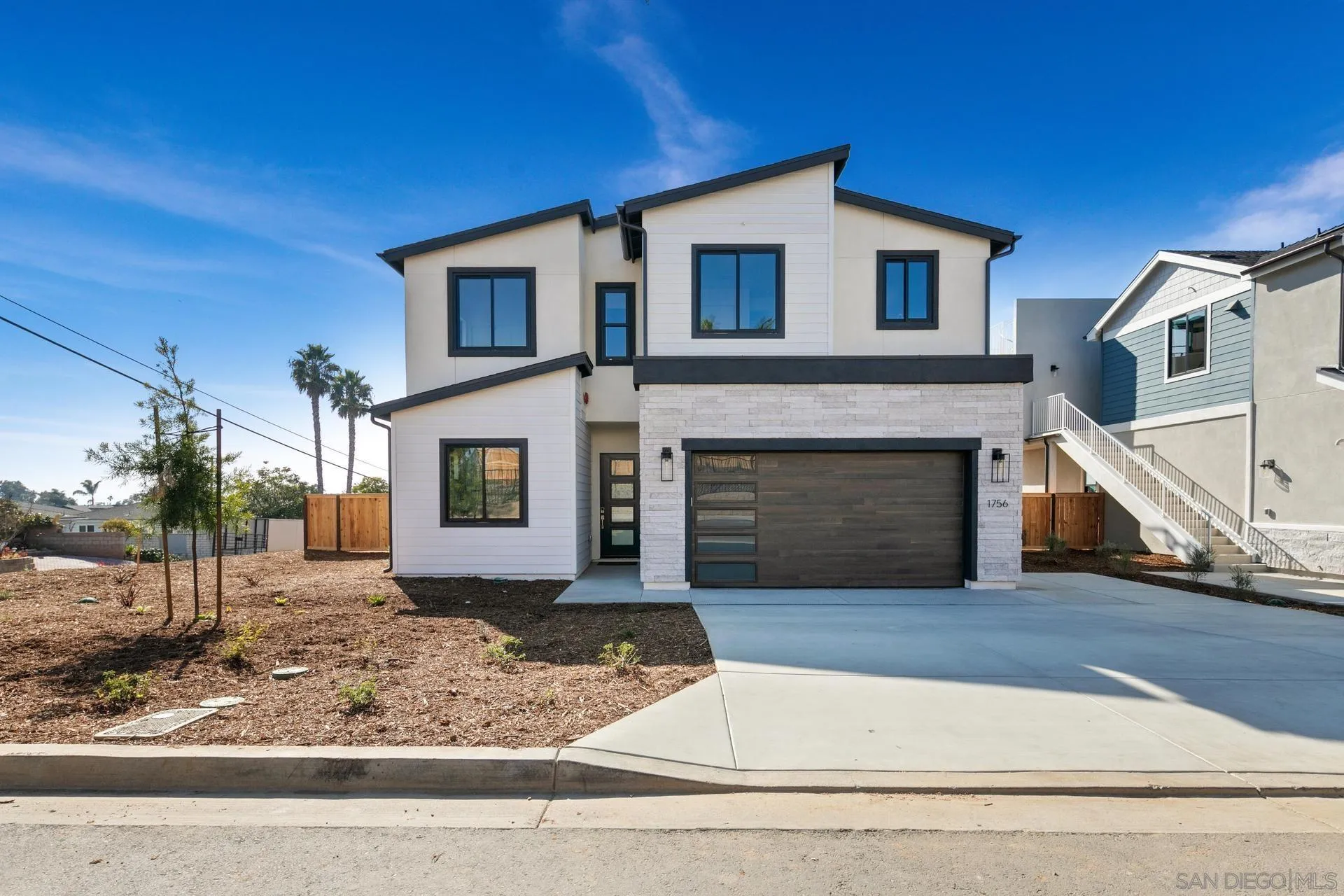 1756 Whaley Street Oceanside, CA 92054 - Photo 1 of 47 a view of a house with a street