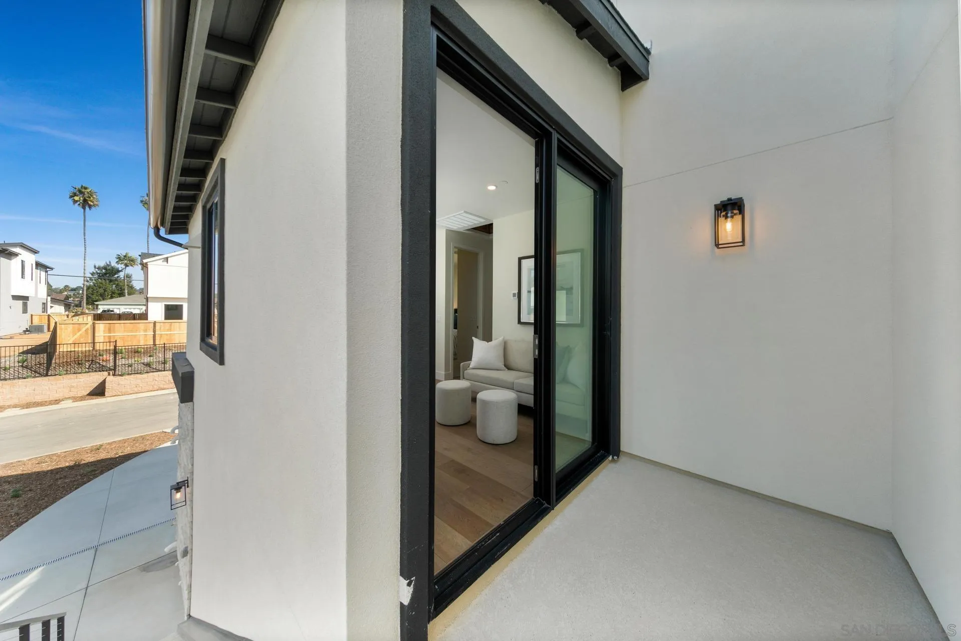 1756 Whaley Street Oceanside, CA 92054 - Photo 38 of 47 a view of a hallway with wooden floor and living room