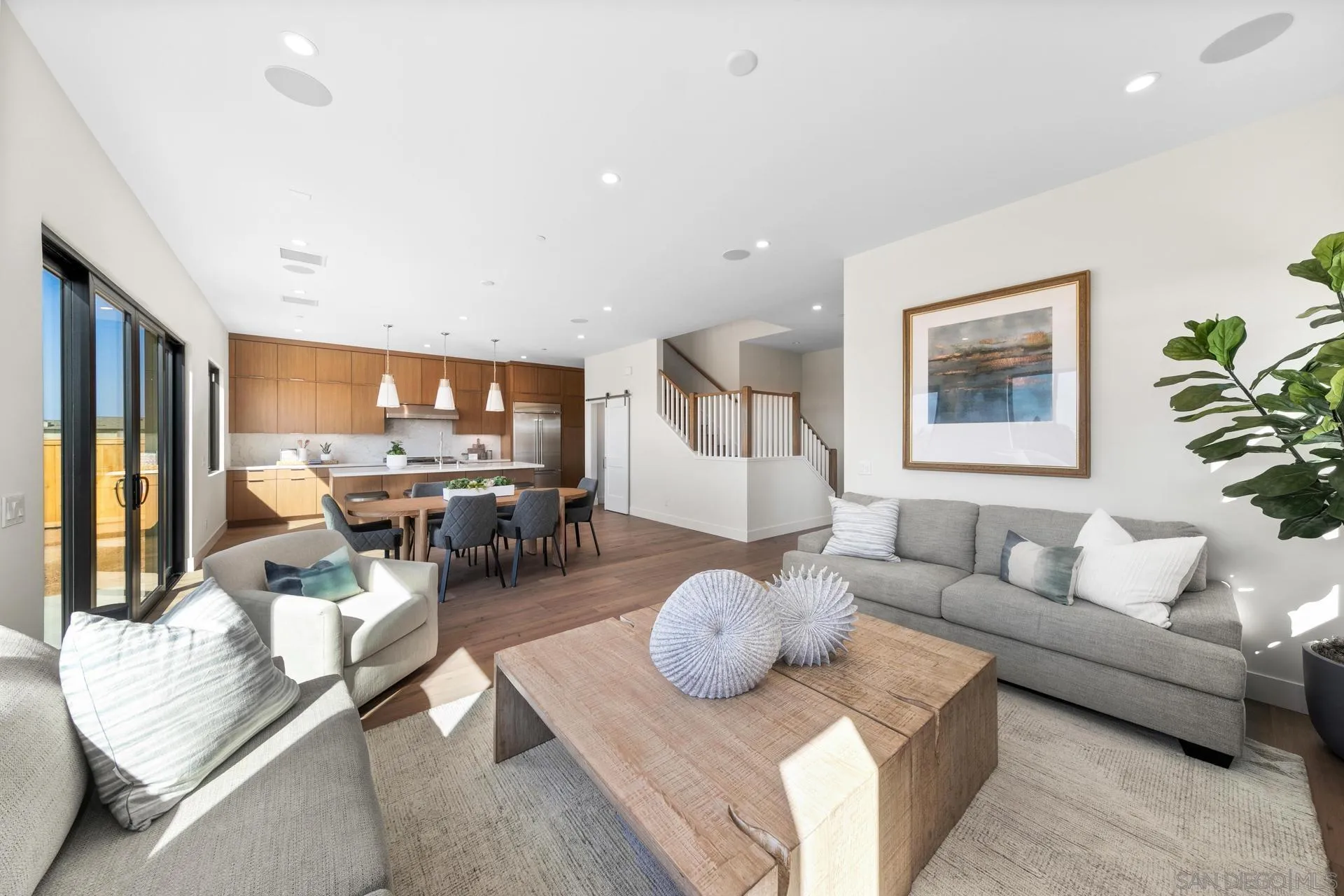 1756 Whaley Street Oceanside, CA 92054 - Photo 5 of 47 a living room with furniture and wooden floor