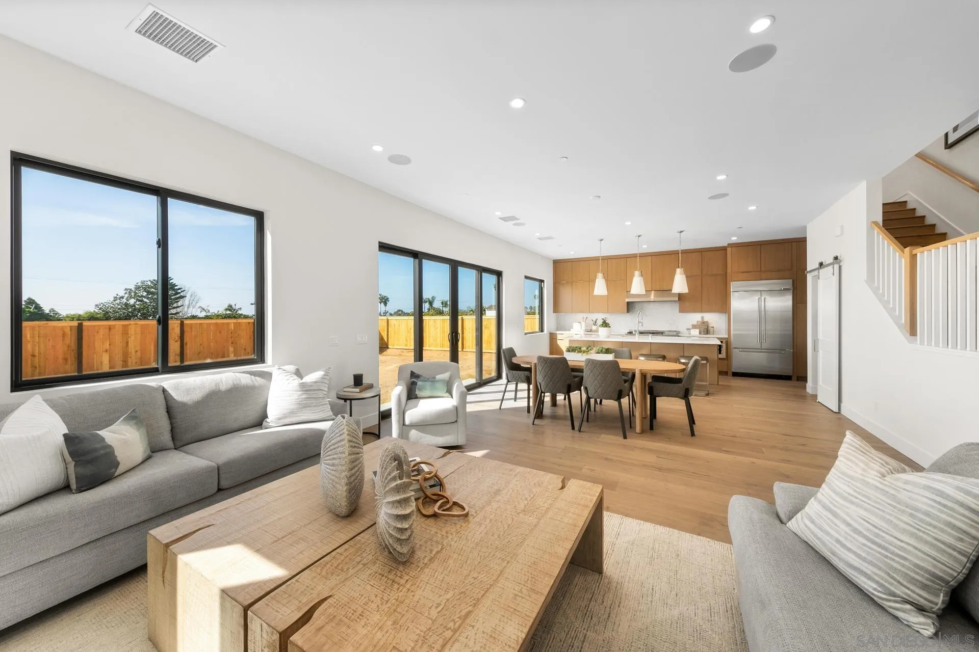 1756 Whaley Street Oceanside, CA 92054 - Photo 6 of 47 a living room with furniture and a large window