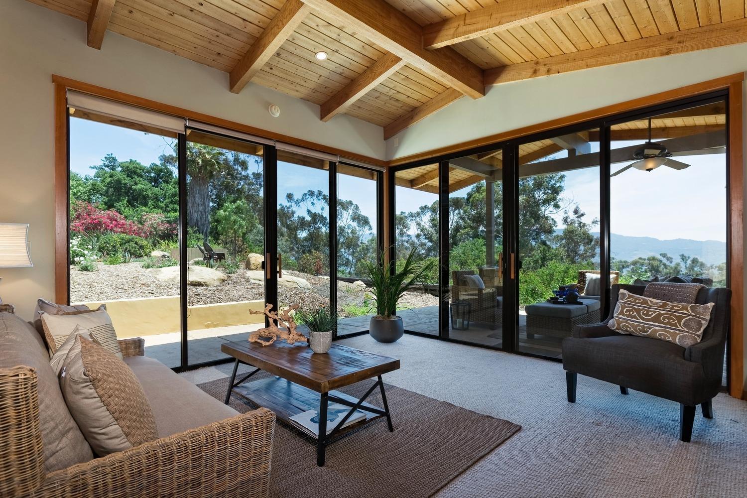 260 Running Ridge Trail Ojai, CA 93023 - Photo 39 of 50 a living room with furniture and a floor to ceiling window