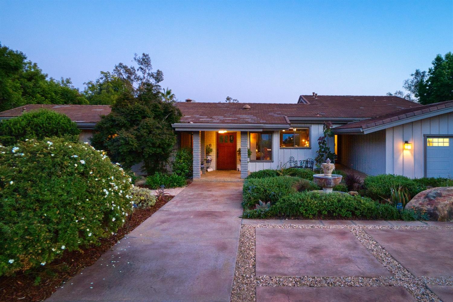 260 Running Ridge Trail Ojai, CA 93023 - Photo 4 of 50 a front view of a house with a yard