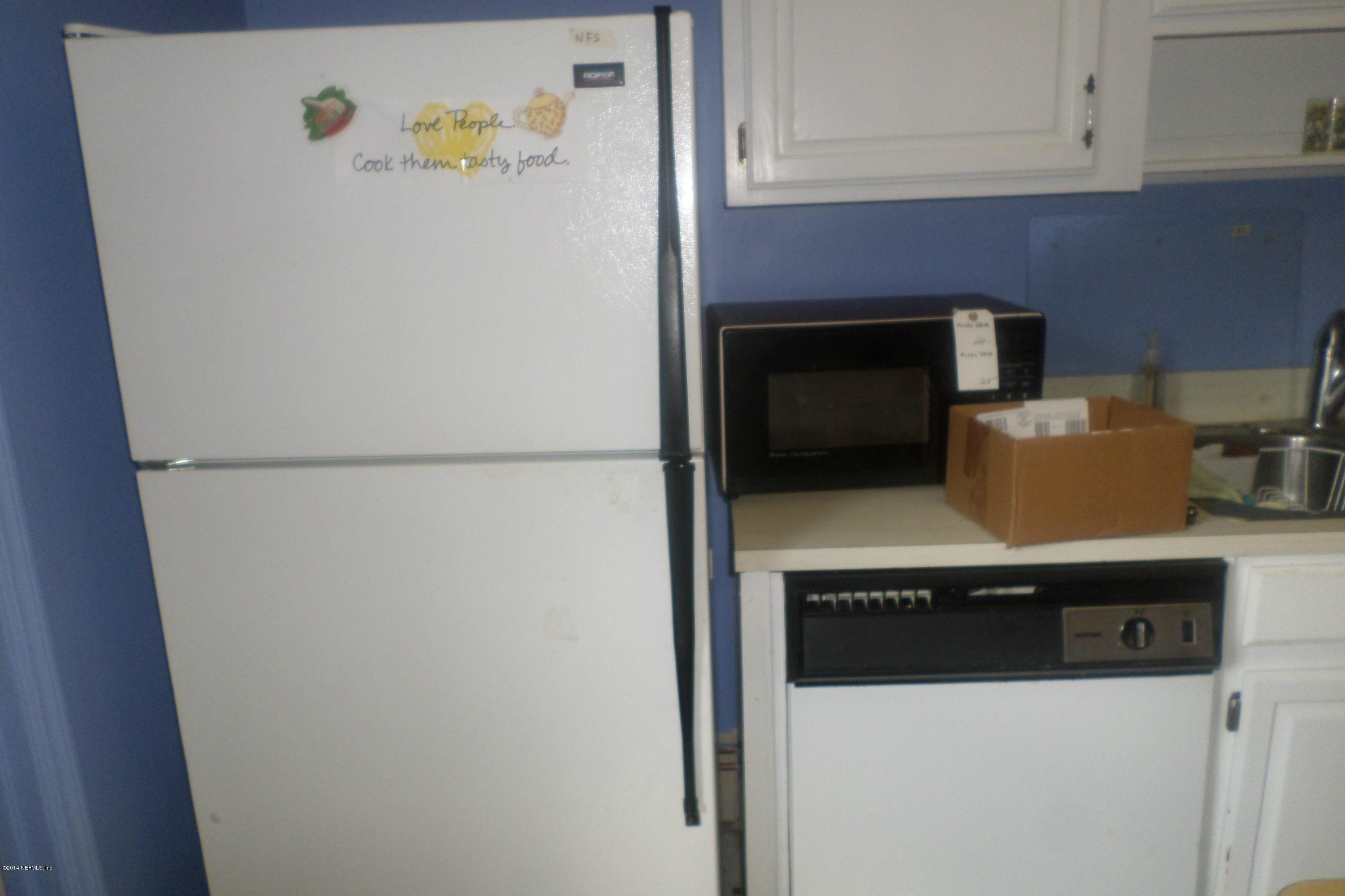 4822 Windrush Lane Jacksonville, FL 32217 - Photo 13 of 23 a utility room with dryer and washer