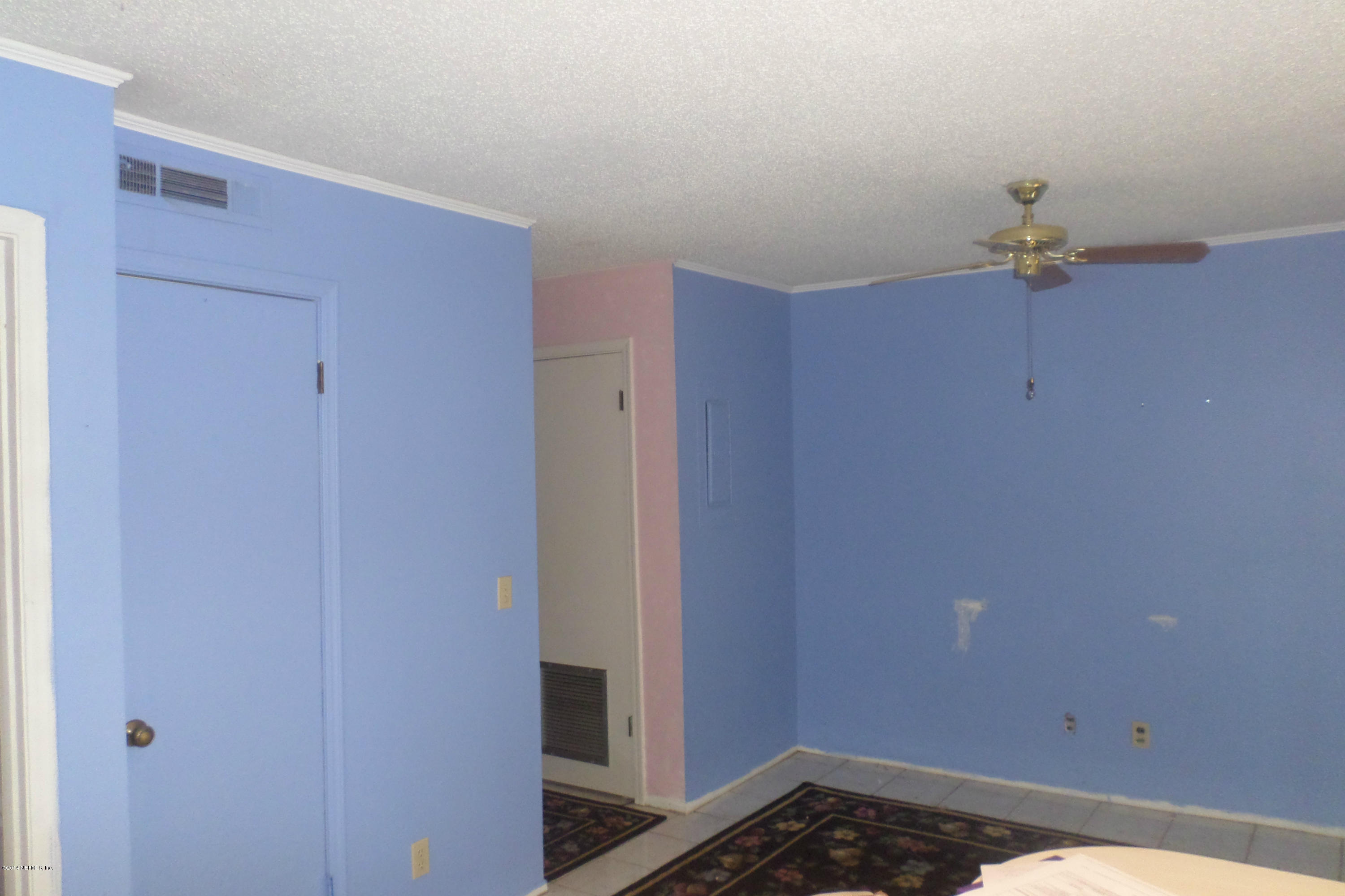 4822 Windrush Lane Jacksonville, FL 32217 - Photo 6 of 23 a view of a hallway with closet