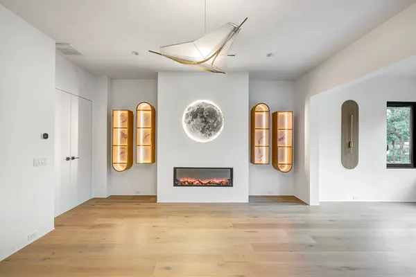 a view of a livingroom with wooden floor