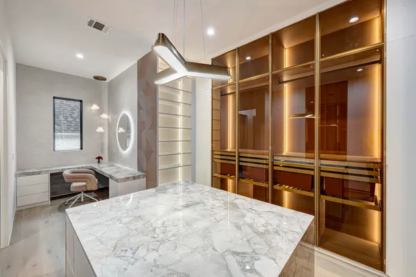 a view of cabinets and wooden floor
