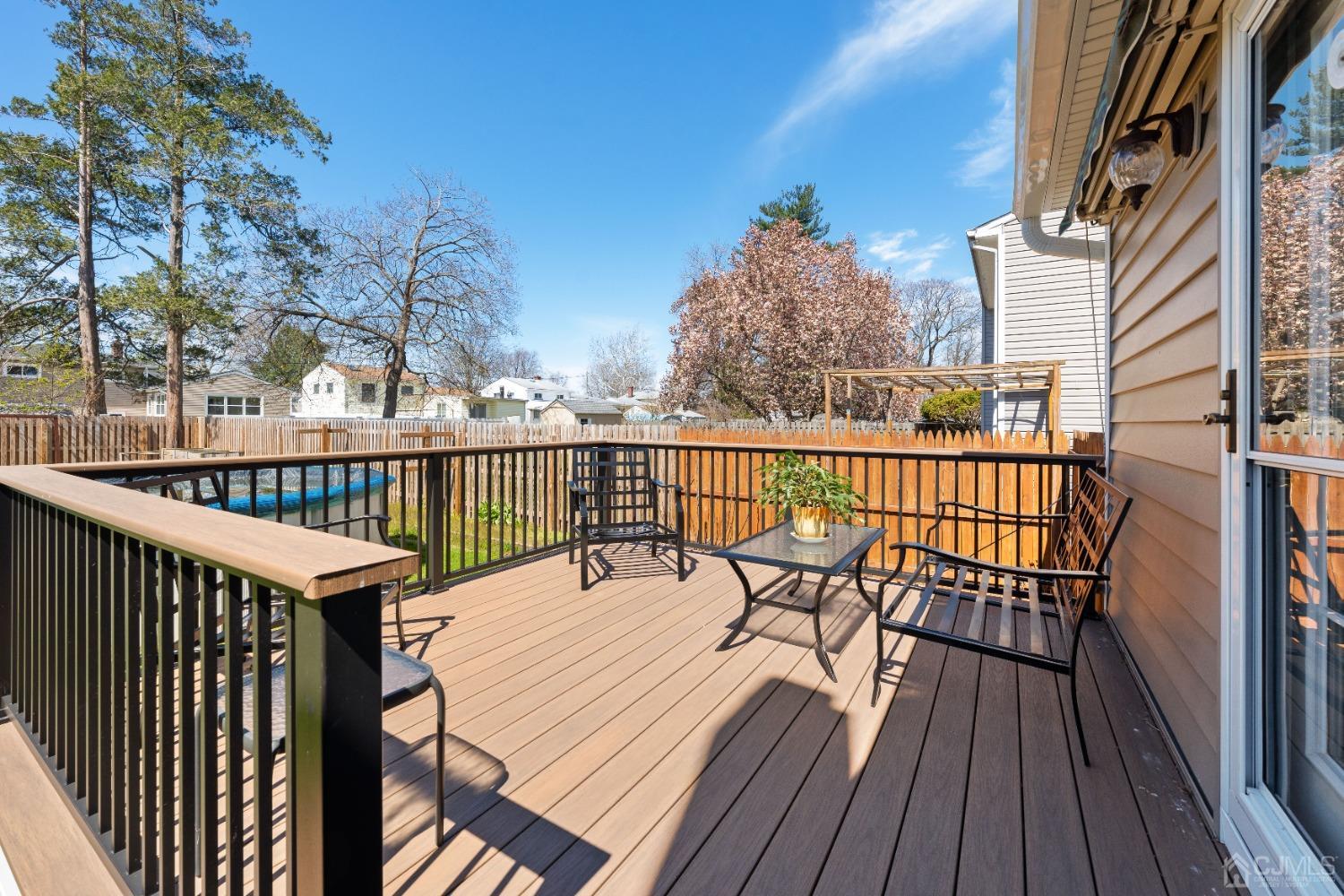 22 Baldwin Road Edison, NJ 08817 - Photo 17 of 30 a view of a balcony with wooden floor and outdoor seating