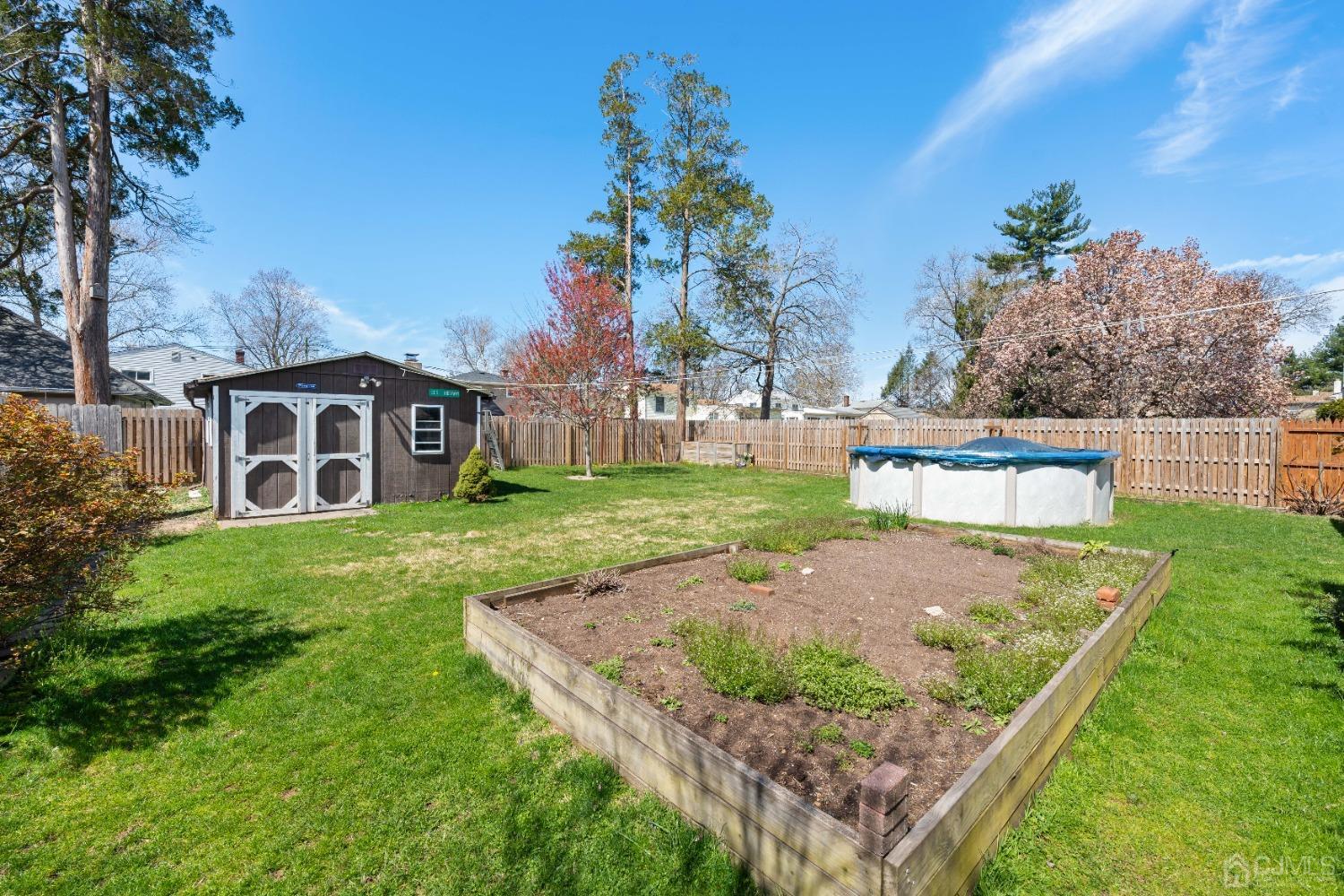 22 Baldwin Road Edison, NJ 08817 - Photo 18 of 30 a view of a house with a yard