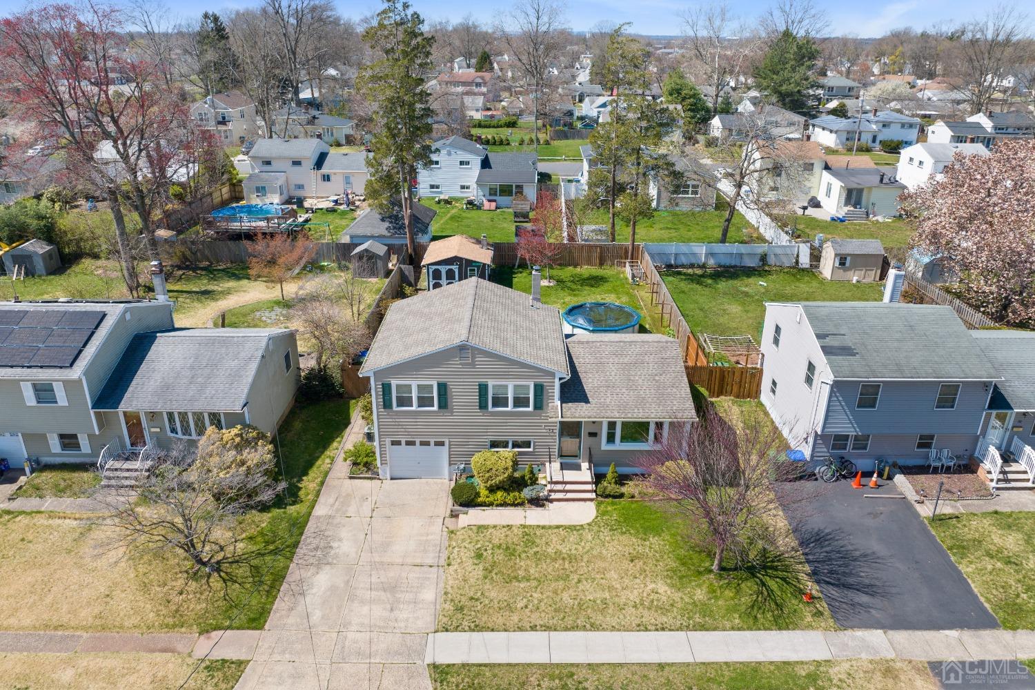 22 Baldwin Road Edison, NJ 08817 - Photo 26 of 30 an aerial view of residential houses with outdoor space and parking