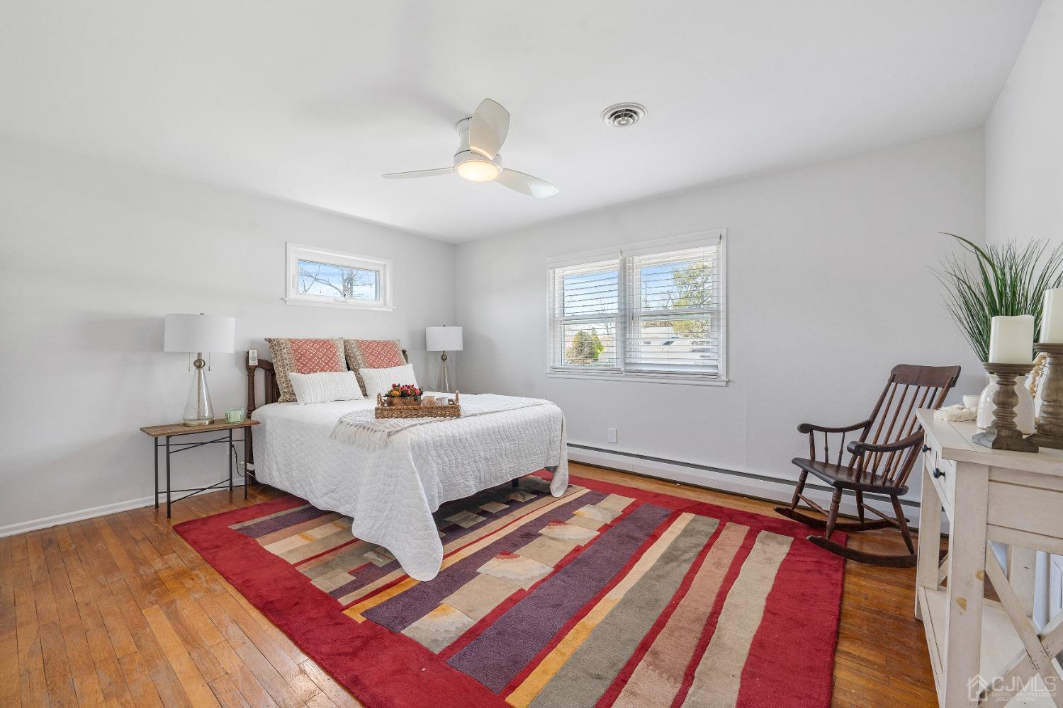 22 Baldwin Road Edison, NJ 08817 - Photo 7 of 30 a living room with furniture and a rug