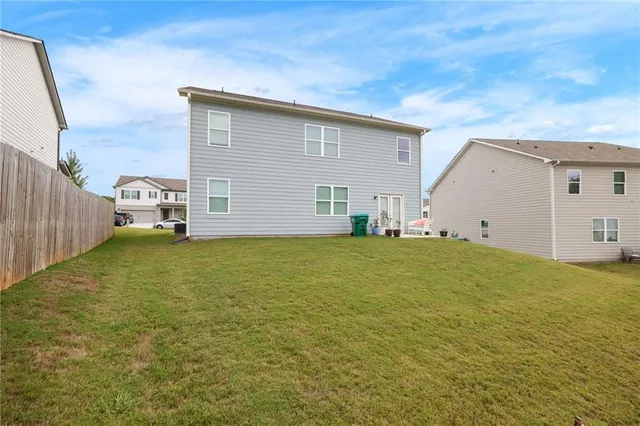 a view of a backyard with a garden